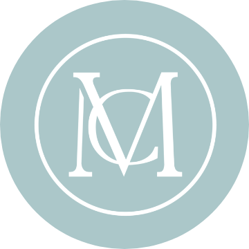 Marble Cliff monogram on blue circle